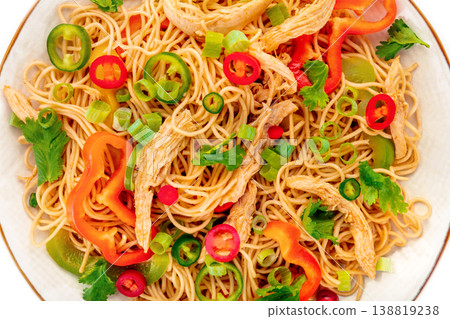 Chow Mein noodles with chicken and vegetables, overhead flat lay shot Chow Mein noodles with chicken and vegetables, overhead flat lay shot 138819238