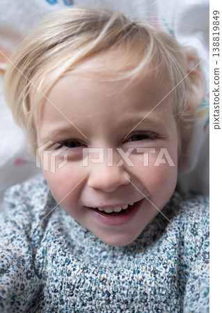 portrait of a laughing 4 year old Caucasian girl with a bright sincere smile portrait of a laughing 4 year old Caucasian girl with a bright sincere smile 138819849