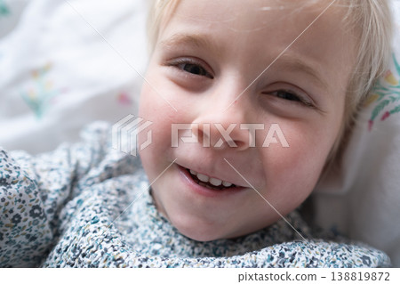 portrait of a laughing 4 year old Caucasian girl with a bright sincere smile portrait of a laughing 4 year old Caucasian girl with a bright sincere smile 138819872