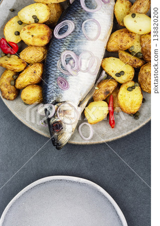 Traditional Salted Herring with Oven Roasted Potatoes Traditional Salted Herring with Oven Roasted Potatoes 138820200