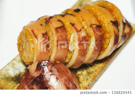 Homemade squid stuffed in a sweet and savory sauce Homemade squid stuffed in a sweet and savory sauce 138820341
