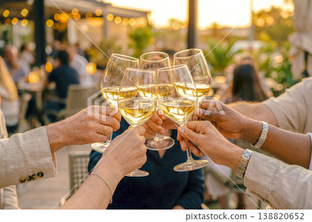 A toast with white wine A toast with white wine 138820652