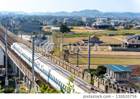 Shinkansen Nozomi N700S bound for Hakata Station; Scenery seen from Shishigami Amusement Park in late autumn (1); Higashi Ward, Okayama City, Okayama Prefecture Shinkansen Nozomi N700S bound for Hakata Station; Scenery seen from Shishigami Amusement Park in late autumn (1); Higashi Ward, Okayama City, Okayama Prefecture 138820756