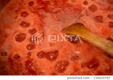 Close up of a Natural tomato sauce boiling in pot Close up of a Natural tomato sauce boiling in pot 138820797
