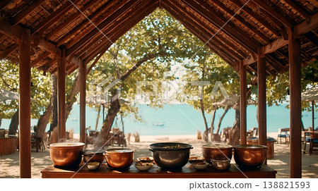 Tropical beachside buffet with steaming pots of food 138821593