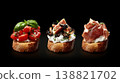 Delicious Bruschetta Trio Tomato, Fig, and Prosciutto Appetizers. 138821702