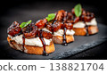 Delicious Bruschetta with Creamy Cheese and Sun Dried Tomatoes 138821704