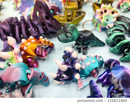 3D printed different art objects. Objects printed on 3D printer from melted colored plastic. Multicolored models created on 3D printer from threads of molten plastic. Modern new additive technologies 3D printed different art objects. Objects printed on 3D printer from melted colored plastic. Multicolored models created on 3D printer from threads of molten plastic. Modern new additive technologies 138821869