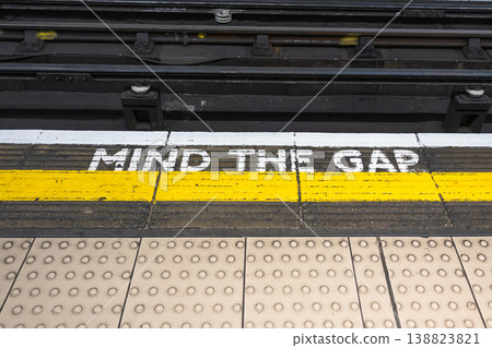 Mind the gap warning on London Underground platform 138823821