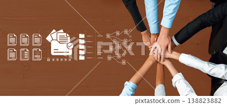 Team Collaboration Concept with Hands Together on Office Desk with Document Icons and Data Flow Representation in Business Environment Ledger 138823882