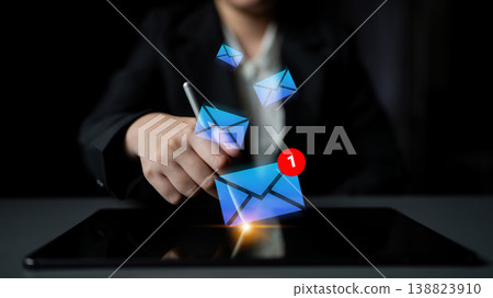Digital Communication Concept with Email Notifications and User Interaction on a Tablet Device in a Dark Environment Gantry Digital Communication Concept with Email Notifications and User Interaction on a Tablet Device in a Dark Environment Gantry 138823910