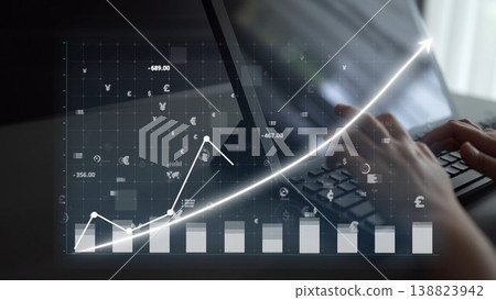 Hands Typing on Laptop with Chart Rising Graph Displaying Financial Data and Currency Symbols in Business Environment for Analytical Insights and Growth Strategies Copula Hands Typing on Laptop with Chart Rising Graph Displaying Financial Data and Currency Symbols in Business Environment for Analytical Insights and Growth Strategies Copula 138823942