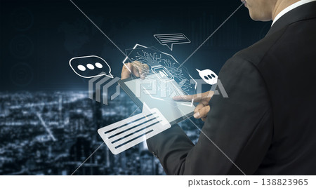 Businessman Using Digital Tablet in Urban Setting with Futuristic Interface and Communication Icons Representing Innovation and Connectivity Gantry Businessman Using Digital Tablet in Urban Setting with Futuristic Interface and Communication Icons Representing Innovation and Connectivity Gantry 138823965