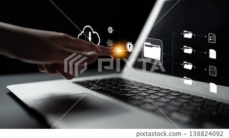 Digital Transformation Concept with Cloud Technology and Cybersecurity Protection Featuring a Hand Interacting with Laptop Display and Data Symbols Quark 138824092
