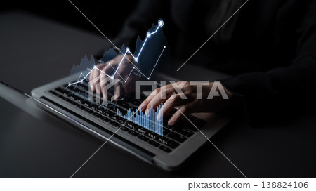 Business professional analyzing financial data on laptop with digital graph overlay showcasing growth metrics and modern analytics technology for stock photography use Scalp Business professional analyzing financial data on laptop with digital graph overlay showcasing growth metrics and modern analytics technology for stock photography use Scalp 138824106