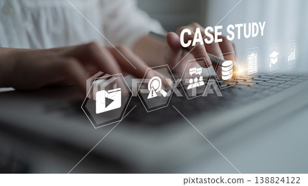 Hands Typing on Laptop with Case Study Icons Representing Data Analysis and Research in Modern Digital Workspace Environment Ledger Hands Typing on Laptop with Case Study Icons Representing Data Analysis and Research in Modern Digital Workspace Environment Ledger 138824122