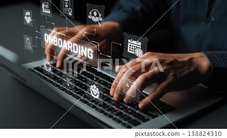 Close-up of hands working on a laptop keyboard with virtual onboarding icons, illustrating modern employee integration and training in a professional environment. Sigmoid Close-up of hands working on a laptop keyboard with virtual onboarding icons, illustrating modern employee integration and training in a professional environment. Sigmoid 138824310