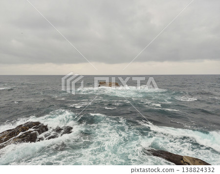 It is a cloudy sky and sea. 138824332