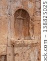 Ancient rock carved niche with scallop shell ornament in Banias Israel 138825025