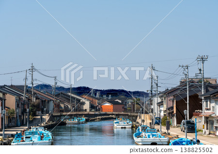 Fishing boat anchored at the fishing port Fishing boat anchored at the fishing port 138825502