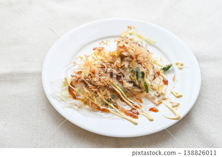 Okonomiyaki-style rice paper dish Okonomiyaki-style rice paper dish 138826011