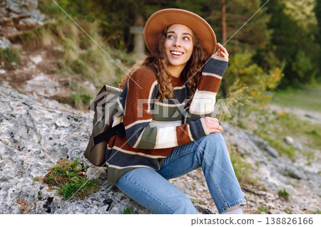 Adventure woman feeling happy among amazing mountains, forest and lake, enjoy the nature landscape Adventure woman feeling happy among amazing mountains, forest and lake, enjoy the nature landscape 138826166