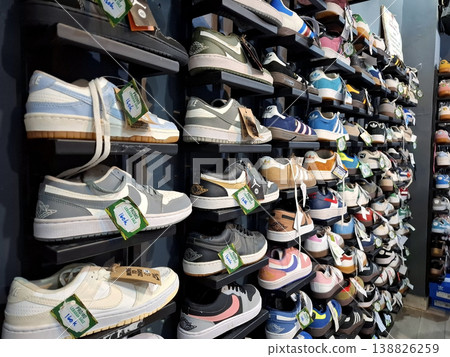 Yogyakarta, Indonesia - March 18th 2026 - Vibrant Casual Sneakers Displayed on Shelves in a Store 138826259