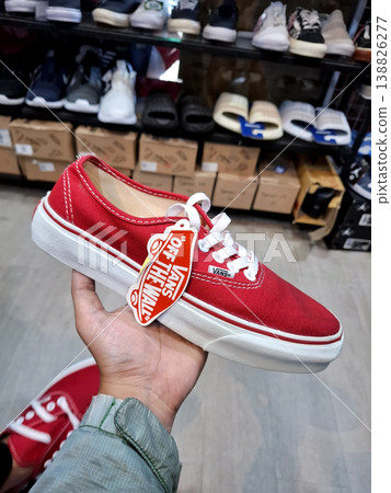 Yogyakarta, Indonesia - March 18th 2026 - Vibrant Casual Red Sneaker Off The Wall Style Energetic Yogyakarta, Indonesia - March 18th 2026 - Vibrant Casual Red Sneaker Off The Wall Style Energetic 138826277