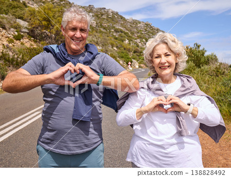 Senior couple, heart hands and fitness outdoor on road, love icon and portrait with smile, workout or health. Mature woman, man and happy with sign, emoji or symbol for exercise in retirement on hill Senior couple, heart hands and fitness outdoor on road, love icon and portrait with smile, workout or health. Mature woman, man and happy with sign, emoji or symbol for exercise in retirement on hill 138828492