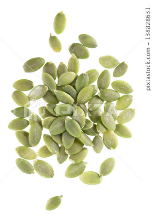 Pumpkin seeds isolated on white background. Green peeled pumpkin seeds. Clipping path. Top view. Pumpkin seeds isolated on white background. Green peeled pumpkin seeds. Clipping path. Top view. 138828631