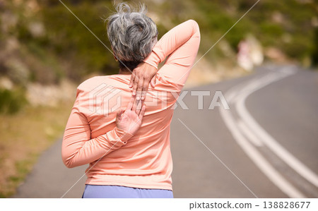 Senior woman runner, stretching back and training in street, nature and exercise for wellness in retirement. Mature lady, running and workout on countryside road, mountains and warm up muscle outdoor Senior woman runner, stretching back and training in street, nature and exercise for wellness in retirement. Mature lady, running and workout on countryside road, mountains and warm up muscle outdoor 138828677