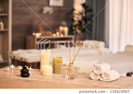 Spa room, candles and hotel background for massage, aromatherapy and self care holiday or vacation. Bokeh, interior and skincare salon with table, furniture and healing tools or fragrance product Spa room, candles and hotel background for massage, aromatherapy and self care holiday or vacation. Bokeh, interior and skincare salon with table, furniture and healing tools or fragrance product 138828907
