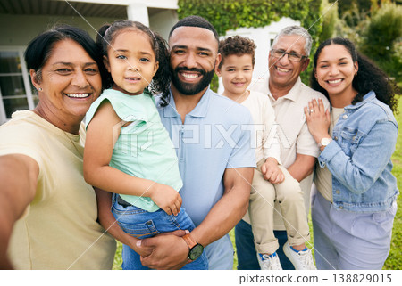 Portrait, grandparents and parents with child outdoor, happiness and bonding at holiday home. Love, care and smile, men and women with young girl on lawn of house, family vacation and relax in garden 138829015