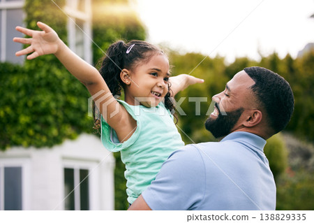 Hug, relax and happy with father and daughter in garden for playful, bonding and love. Happiness, real estate and smile with man and child playing in backyard of family home for new house or laughing 138829335