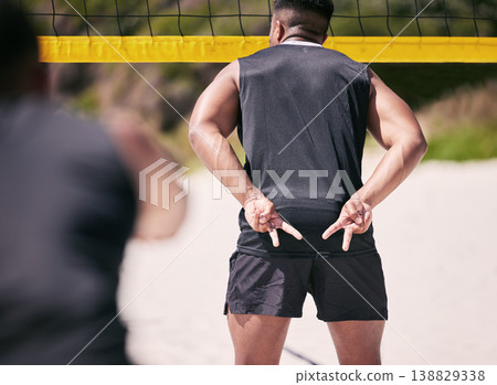 Beach, back or man with volleyball hand gesture for communication, strategy or block signal. Sports, fitness or healthy athlete with sign ready for workout, match or fun game outdoors in summer Beach, back or man with volleyball hand gesture for communication, strategy or block signal. Sports, fitness or healthy athlete with sign ready for workout, match or fun game outdoors in summer 138829338