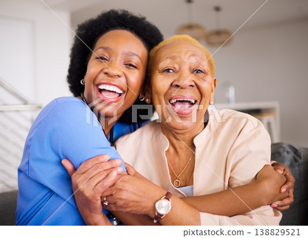 Black people, nurse and patient hug in elderly care for love, support and trust together on sofa at home. Portrait of happy African medical caregiver enjoying time with senior female person in house Black people, nurse and patient hug in elderly care for love, support and trust together on sofa at home. Portrait of happy African medical caregiver enjoying time with senior female person in house 138829521