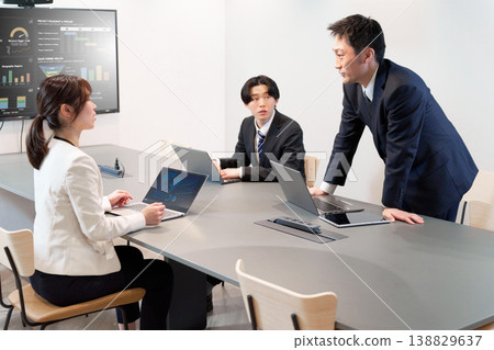 Active business meetings where teams tackle challenges together. Active business meetings where teams tackle challenges together. 138829637