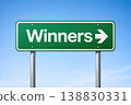Green winners direction sign with arrow pointing right on clear sky background 138830331