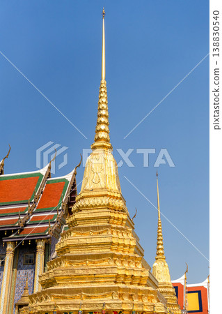 Close views show glass mosaic, gilded trim, and exterior ornament at Wat Phra Kaew. The details highlight temple craft and facade texture. Close views show glass mosaic, gilded trim, and exterior ornament at Wat Phra Kaew. The details highlight temple craft and facade texture. 138830540