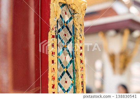 Close views show glass mosaic, gilded trim, and exterior ornament at Wat Phra Kaew. The details highlight temple craft and facade texture. Close views show glass mosaic, gilded trim, and exterior ornament at Wat Phra Kaew. The details highlight temple craft and facade texture. 138830541