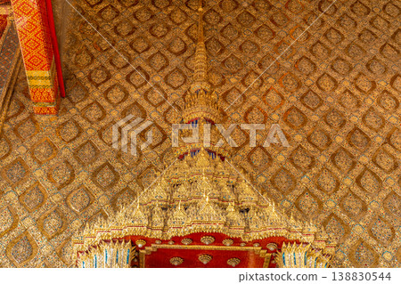 Close views show glass mosaic, gilded trim, and exterior ornament at Wat Phra Kaew. The details highlight temple craft and facade texture. Close views show glass mosaic, gilded trim, and exterior ornament at Wat Phra Kaew. The details highlight temple craft and facade texture. 138830544