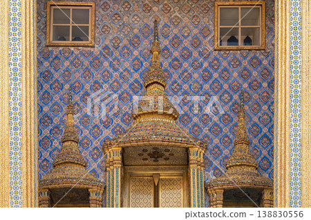 Close views show glass mosaic, gilded trim, and exterior ornament at Wat Phra Kaew. The details highlight temple craft and facade texture. Close views show glass mosaic, gilded trim, and exterior ornament at Wat Phra Kaew. The details highlight temple craft and facade texture. 138830556