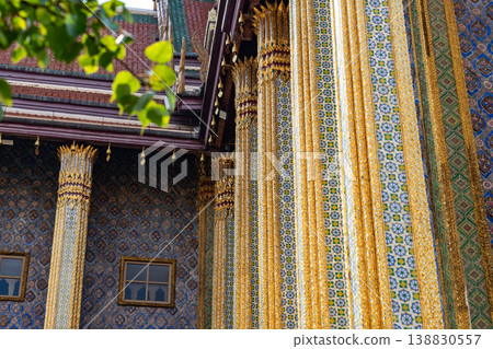 Close views show glass mosaic, gilded trim, and exterior ornament at Wat Phra Kaew. The details highlight temple craft and facade texture. Close views show glass mosaic, gilded trim, and exterior ornament at Wat Phra Kaew. The details highlight temple craft and facade texture. 138830557