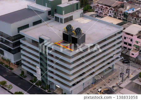 Cooling towers in data center building. 138831058