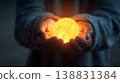 Holding a glowing sun orb in cupped hands, symbolizing hope and new beginnings 138831384