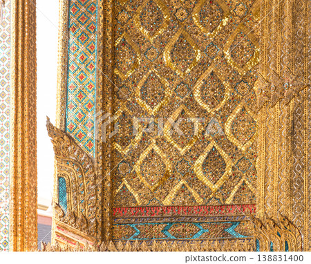 Patterned walls, frames, and roof edges create a rich study of Thai temple design. Repeated motifs and colors fill each close architectural view. Patterned walls, frames, and roof edges create a rich study of Thai temple design. Repeated motifs and colors fill each close architectural view. 138831400