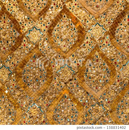 Patterned walls, frames, and roof edges create a rich study of Thai temple design. Repeated motifs and colors fill each close architectural view. Patterned walls, frames, and roof edges create a rich study of Thai temple design. Repeated motifs and colors fill each close architectural view. 138831402