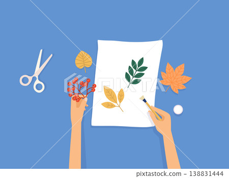 Female hands a scrap booking on blue  background. Colorful vector illustration in flat style. 138831444