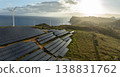 Solar energy panels photovoltaic cell and wind power plants on the seashore landscape for production of renewable green energy 138831762