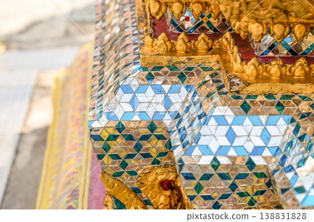 Sunlight catches mirror glass, painted surfaces, and gold edges across the temple exterior. Each close crop emphasizes texture, shine, and depth. Sunlight catches mirror glass, painted surfaces, and gold edges across the temple exterior. Each close crop emphasizes texture, shine, and depth. 138831828